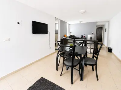 Una televisión o centro de entretenimiento en Loft Sipeh Xalapa Departamento 4