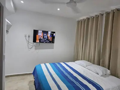 Cama o camas de una habitación en Nayuu' Estudio