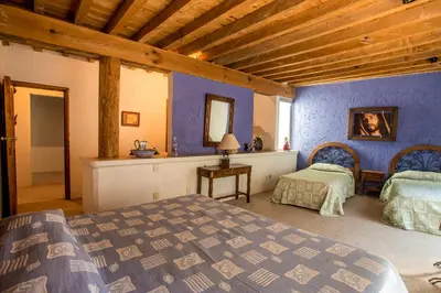 Cama o camas de una habitación en Casa de campo, jardín con juegos privado