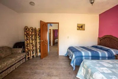 Cama o camas de una habitación en Casa de campo, jardín con juegos privado