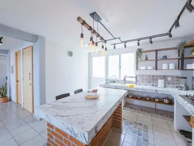 Una cocina o zona de cocina en Comfortable Retreat in Cocoyoc Pool & BBQ