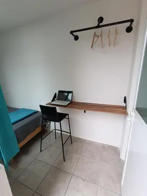 Una televisión o centro de entretenimiento en Comfortable Retreat in Cocoyoc Pool & BBQ
