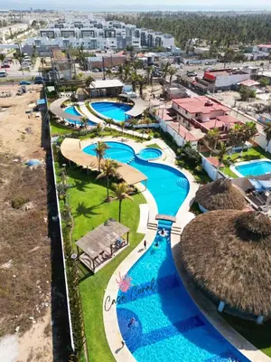 Piscina en o cerca de Depa Coral con Club de Playa Exclusivo Playa Bonfil Diamante