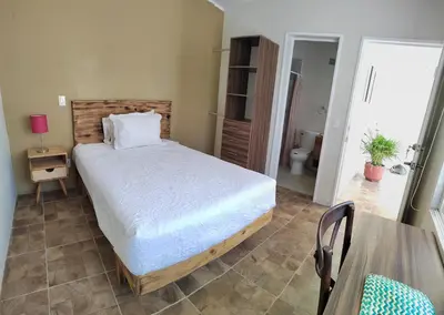 Cama o camas de una habitación en Casa Plutarco habitación 2