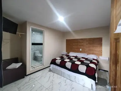 Cama o camas de una habitación en Hotel Mextlitlán Tierra de Lunas