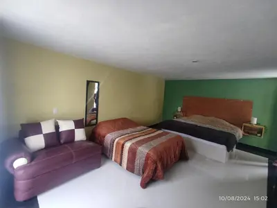 Cama o camas de una habitación en Hotel Mextlitlán Tierra de Lunas