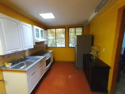 Una cocina o zona de cocina en El Refugio