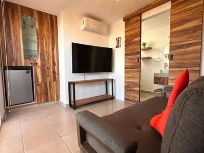 Una televisión o centro de entretenimiento en Hermosa Villa Acapulco Zona Diamante