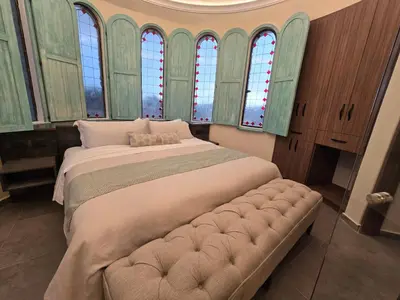 Cama o camas de una habitación en Castello di Carlo - Suite Carlo VII