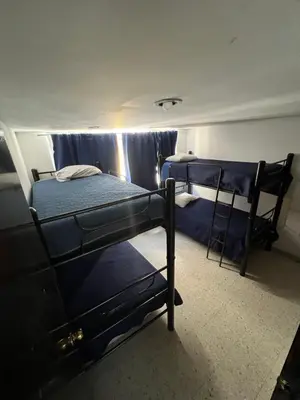 Cama o camas de una habitación en BORAR PRUEBa