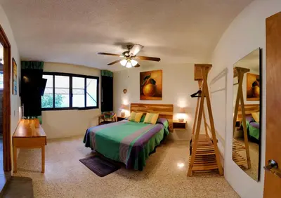 Cama o camas de una habitación en Luz Casa de Huespedes