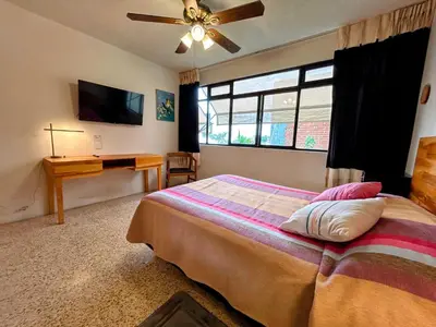 Cama o camas de una habitación en Luz Casa de Huespedes