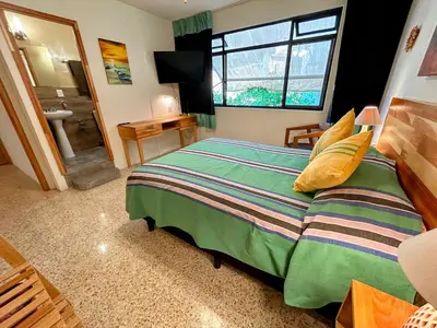 Cama o camas de una habitación en Luz Casa de Huespedes