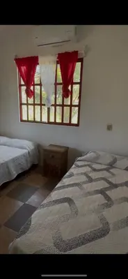 Cama o camas de una habitación en Quinta Raquel