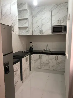 Una cocina o zona de cocina en casa jireh