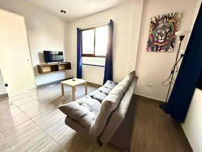 Una televisión o centro de entretenimiento en Alojamientos Xolotl