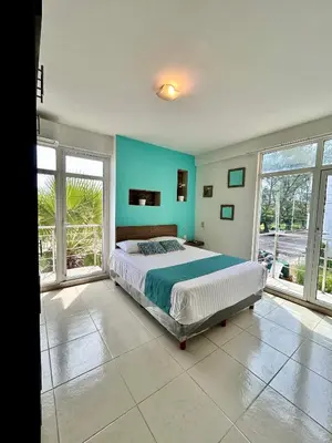 Cama o camas de una habitación en Charming and Family With a pool and ocean view, 3 blocks from the beach, with 2 TVs and Netflix & HBO