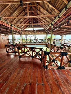 Un restaurante o sitio para comer en Villas Coco Mare Habitacion 4