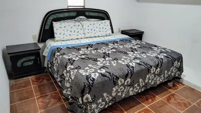 Cama o camas de una habitación en Cómodo y acogedor departamento