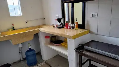Una cocina o zona de cocina en Cómodo y acogedor departamento