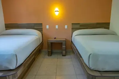 Cama o camas de una habitación en Coral Clubes Santa María