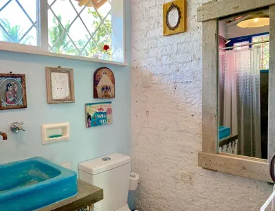 Un baño de Villa Poesía