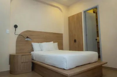 Cama o camas de una habitación en Hotel & hostal Morada