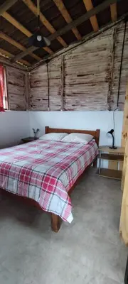 Cama o camas de una habitación en Cabañas Tres Soles