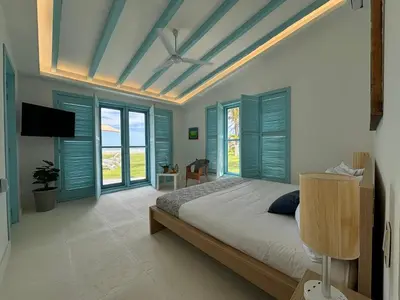 Cama o camas de una habitación en Casa Playa Infinita