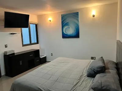 Cama o camas de una habitación en Hermoso Penthouse