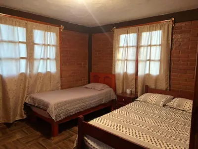 Cama o camas de una habitación en Cabaña la Escondida
