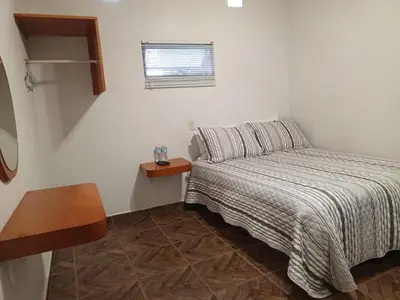 Cama o camas de una habitación en Posada Valle Sagrado