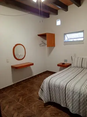 Cama o camas de una habitación en Posada Valle Sagrado
