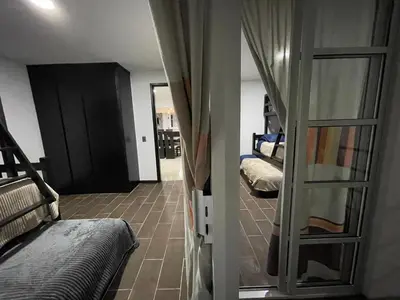 Cama o camas de una habitación en Hospedaje Chignahuapan