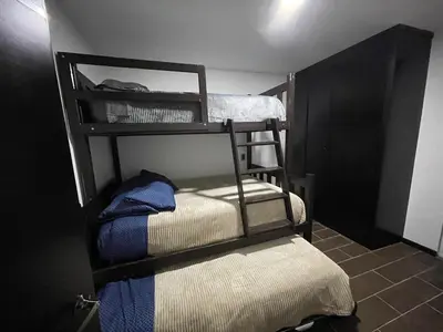 Cama o camas de una habitación en Hospedaje Chignahuapan