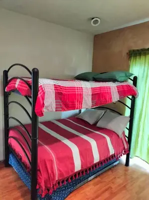 Cama o camas de una habitación en Casa de las iguanas