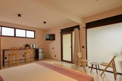 Una televisión o centro de entretenimiento en Hotel Boutique Casa Bendición