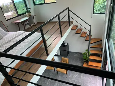 Cama o camas de una habitación en Casa Carolina Loft Romace