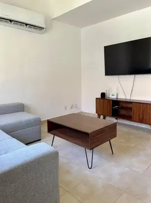 Una televisión o centro de entretenimiento en Villa Sol Terrasol Acapulco Diamante