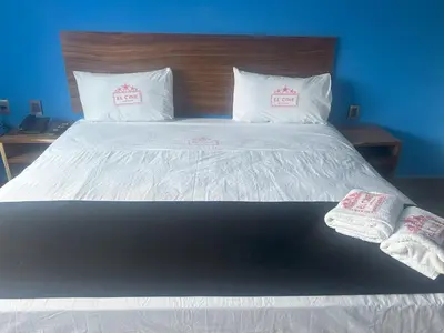 Cama o camas de una habitación en Auto Hotel El Cine