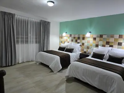 Cama o camas de una habitación en Condesa Hotel Boutique Zacatlán
