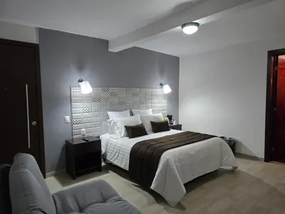 Cama o camas de una habitación en Condesa Hotel Boutique Zacatlán