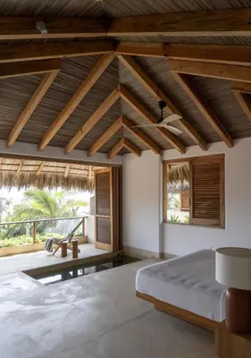 Cama o camas de una habitación en Casa Naa - La Flia Beach House Luxury