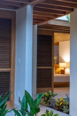 Cama o camas de una habitación en Casa Yaa - La Flia Beachfront Luxury