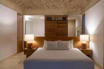 Cama o camas de una habitación en Casa Zaa - La Flia Beachfront Luxury
