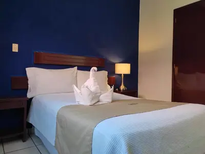 Cama o camas de una habitación en Hotel RENACIMIENTO