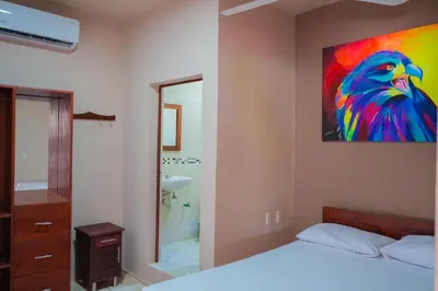Cama o camas de una habitación en Posada El Mágico