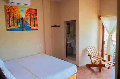 Cama o camas de una habitación en Posada El Mágico