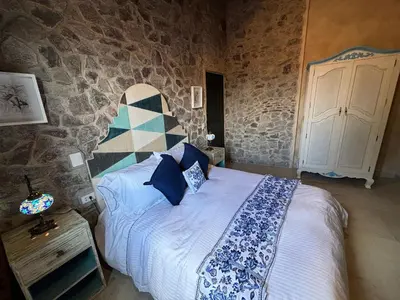 Cama o camas de una habitación en Suite Leonardo: Acogedor Espacio en ValQuirico