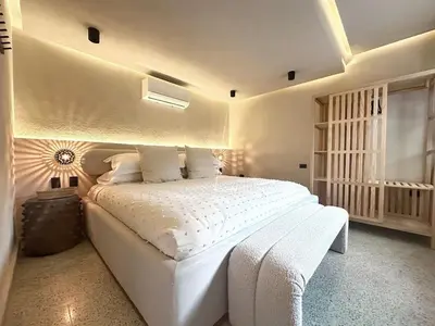 Cama o camas de una habitación en Casa Escorpión Oaxaca · · Handmade in Oaxaca · A/C · Patio · Rooftop ·
